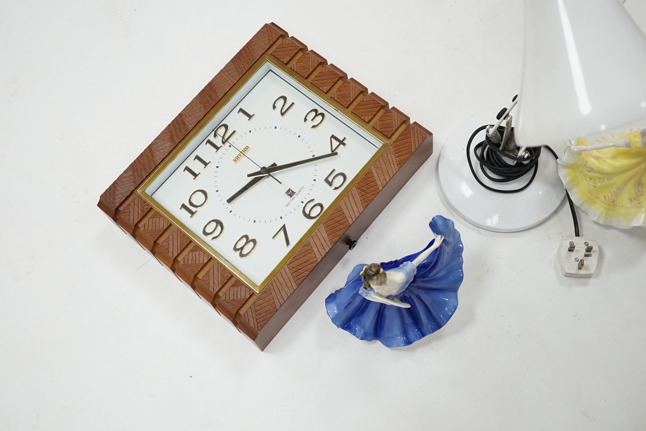 An Art Deco style wall timepiece, an anglepoise lamp and two Doulton figurines